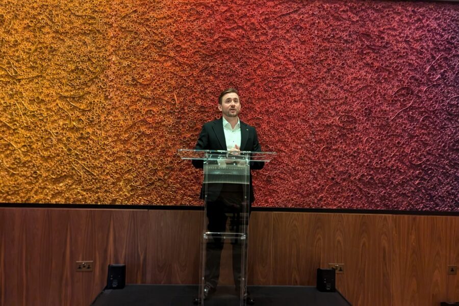 Kevin Durham at the lectern hosting a hotel opening