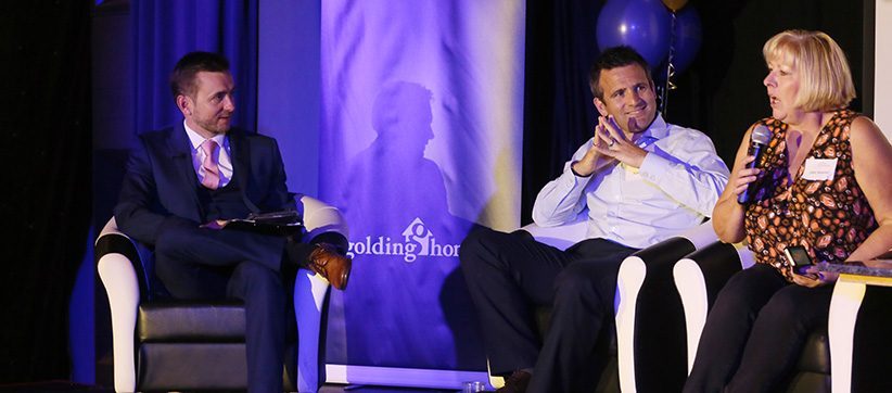 Kevin Durham moderating a conference panel