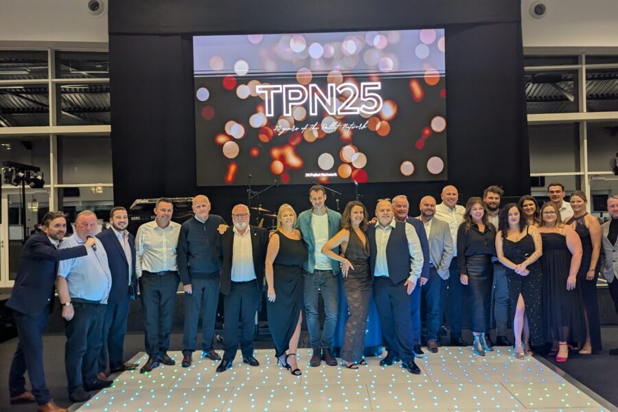 Kevin Durham with the whole team on stage at the TPN 25 conference